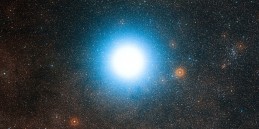 The bright star Alpha Centauri and its surroundings