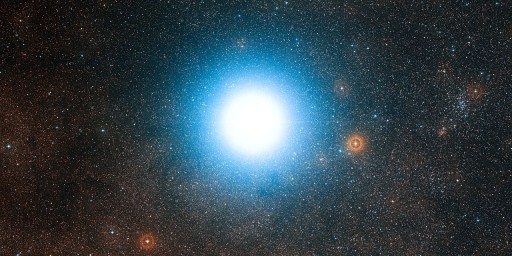 The bright star Alpha Centauri and its surroundings