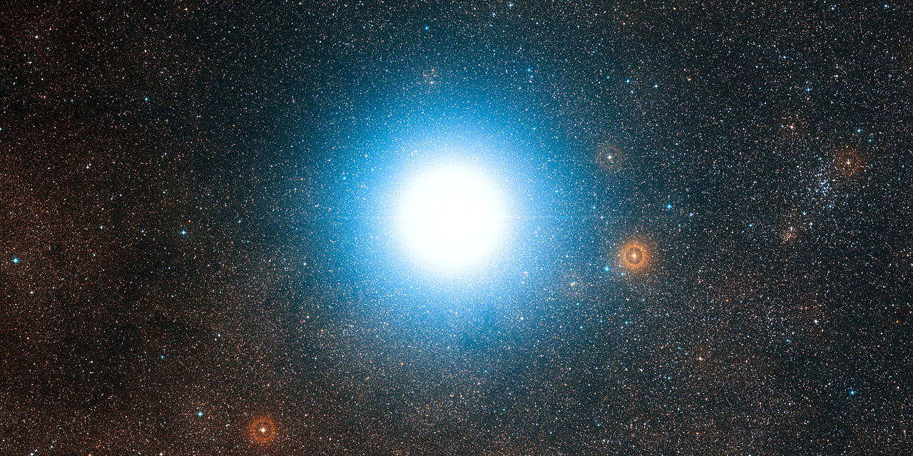 Artwork: The bright star Alpha Centauri and its surroundings Artwork: The bright star Alpha Centauri and its surroundings