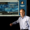 Ray Kurzweil with the KurzweilAI.net homepage, circa 2003